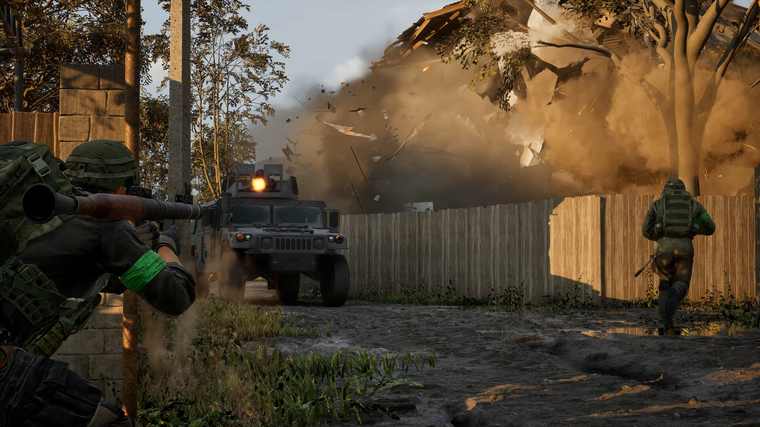 Infantry fighting beside an armoured vehicle in a village street with dust and smoke